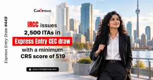 Graphic from CanApprove for Express Entry Draw #449. Text reads “IRCC issues 2,500 ITAs in Express Entry CEC draw with a minimum CRS score of 519.” A smiling woman with long dark curly hair, wearing a black blazer and white shirt and carrying a black shoulder bag, walks along a waterfront with the Toronto skyline and CN Tower behind her.